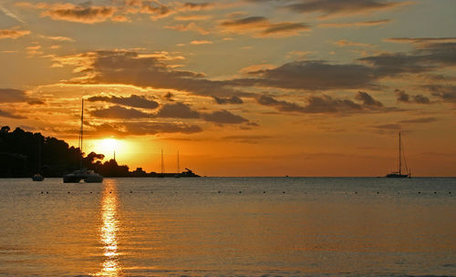 Scenic view of sea against sky during sunset