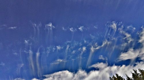 Low angle view of clouds in blue sky