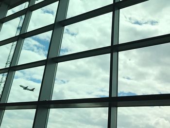 Low angle view of sky seen through window