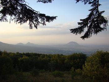 Scenic view of mountains against sky during sunset