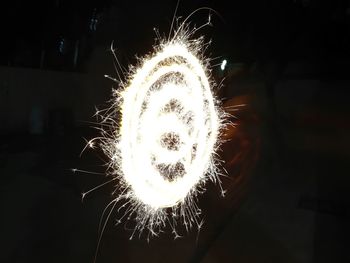 Close-up of illuminated firework display at night