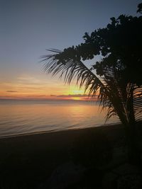 Scenic view of sea against dramatic sky