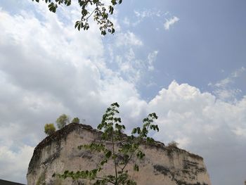 Low angle view of old building against sky