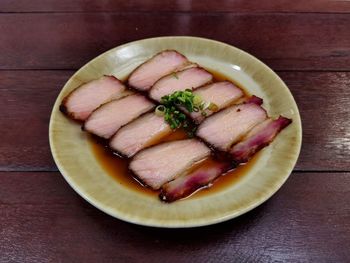 High angle view of fruit salad in plate on table