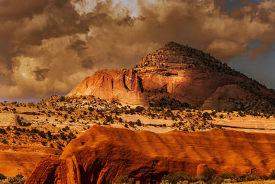 Scenic view of rock formations against sky