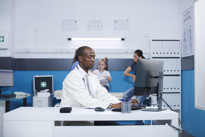 Female doctor working in laboratory