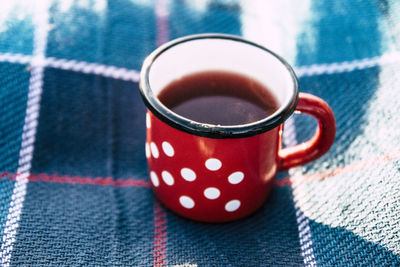 Close-up of coffee cup on table