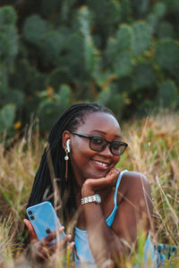 Young woman using mobile phone