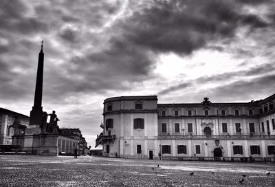 View of historical building against cloudy sky