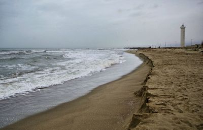 Scenic view of beach against sky