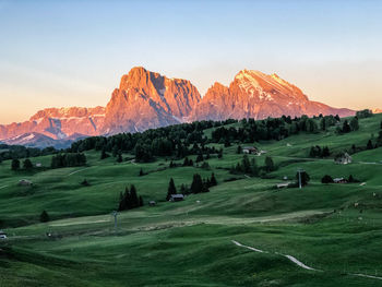 Scenic view of landscape and mountains against sky