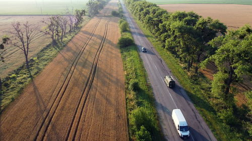High angle view of road amidst field