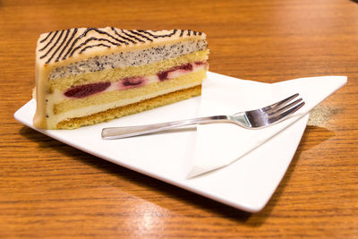 Close-up of cake in plate on table