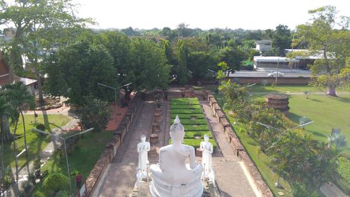 Rear view of statue against sky