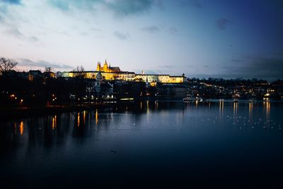 Illuminated city at waterfront