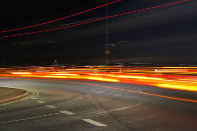 Light trails on road at night