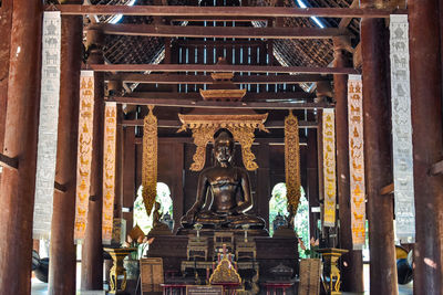 Statue of temple in building