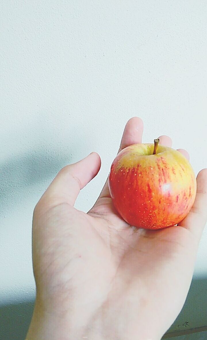 food and drink, food, fruit, healthy eating, person, freshness, holding, close-up, part of, cropped, red, ripe, organic, indoors, unrecognizable person, human finger, personal perspective