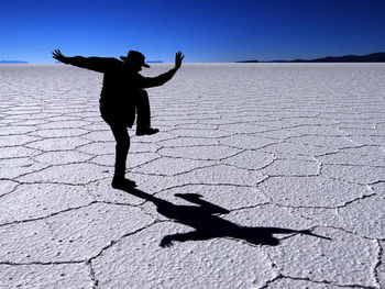 Shadow of woman on the ground