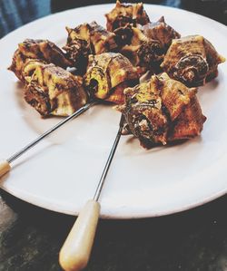 High angle view of meat in plate on table