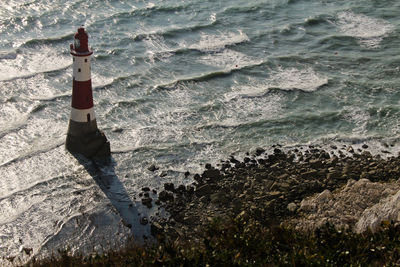 High angle view of lighthouse on beach