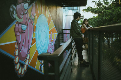 Low angle view of people walking on steps