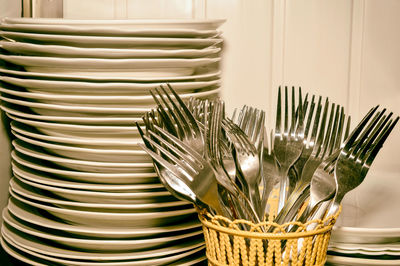 Stack of plates and spoons