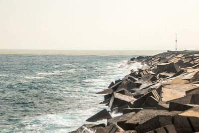 Scenic view of sea against clear sky