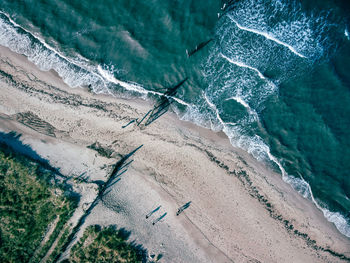 High angle view of surf on beach