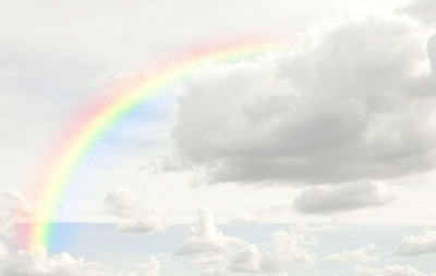 Low angle view of rainbow against sky