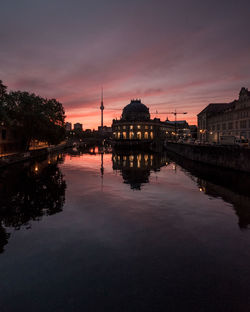 Reflection of illuminated buildings in water