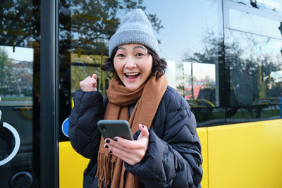 Young woman using mobile phone