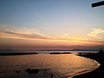 Scenic view of sea at sunset