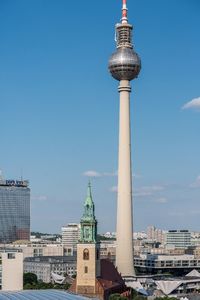 View of communications tower in city