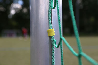 Close-up of net in soccer field