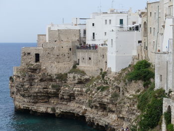 Rocky coastline of polignano a mare, puglia, italy 2022