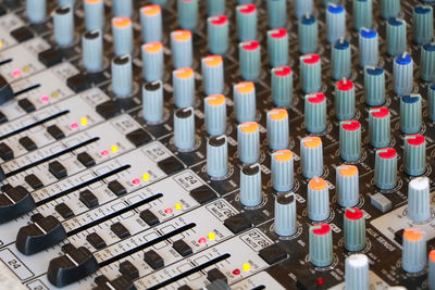 Full frame shot of sound mixer at studio