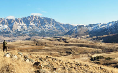 Scenic view of desert against clear sky