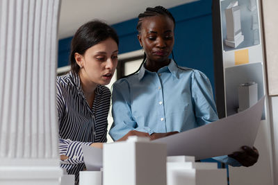 Business colleagues working in office