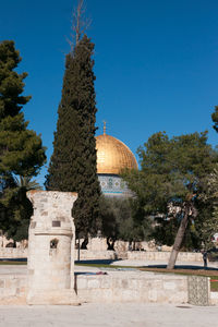 View of historical building against blue sky