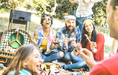 Group of people sitting outdoors