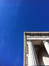 Low angle view of building against blue sky