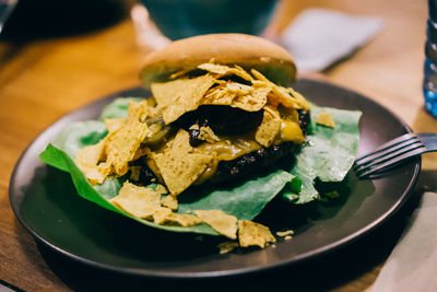 Close-up of meat in plate on table