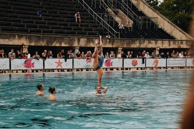 Group of people at swimming pool