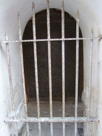 Close-up of metal grate window