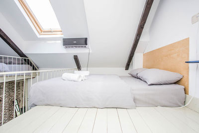 White bed on wall at home