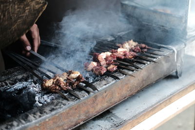 Close-up of meat on barbecue grill