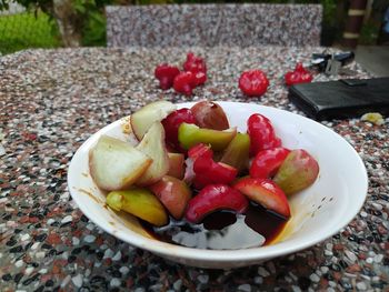 High angle view of fruits in bowl on table