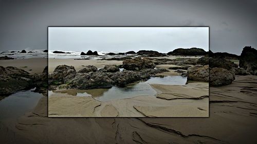Scenic view of beach against sky