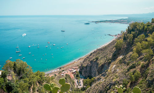 High view of turquoise mediterranean sea in taormina, sicily, italy during a summer day